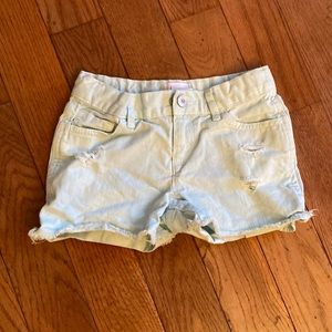 Girls mint colored distressed denim shorts